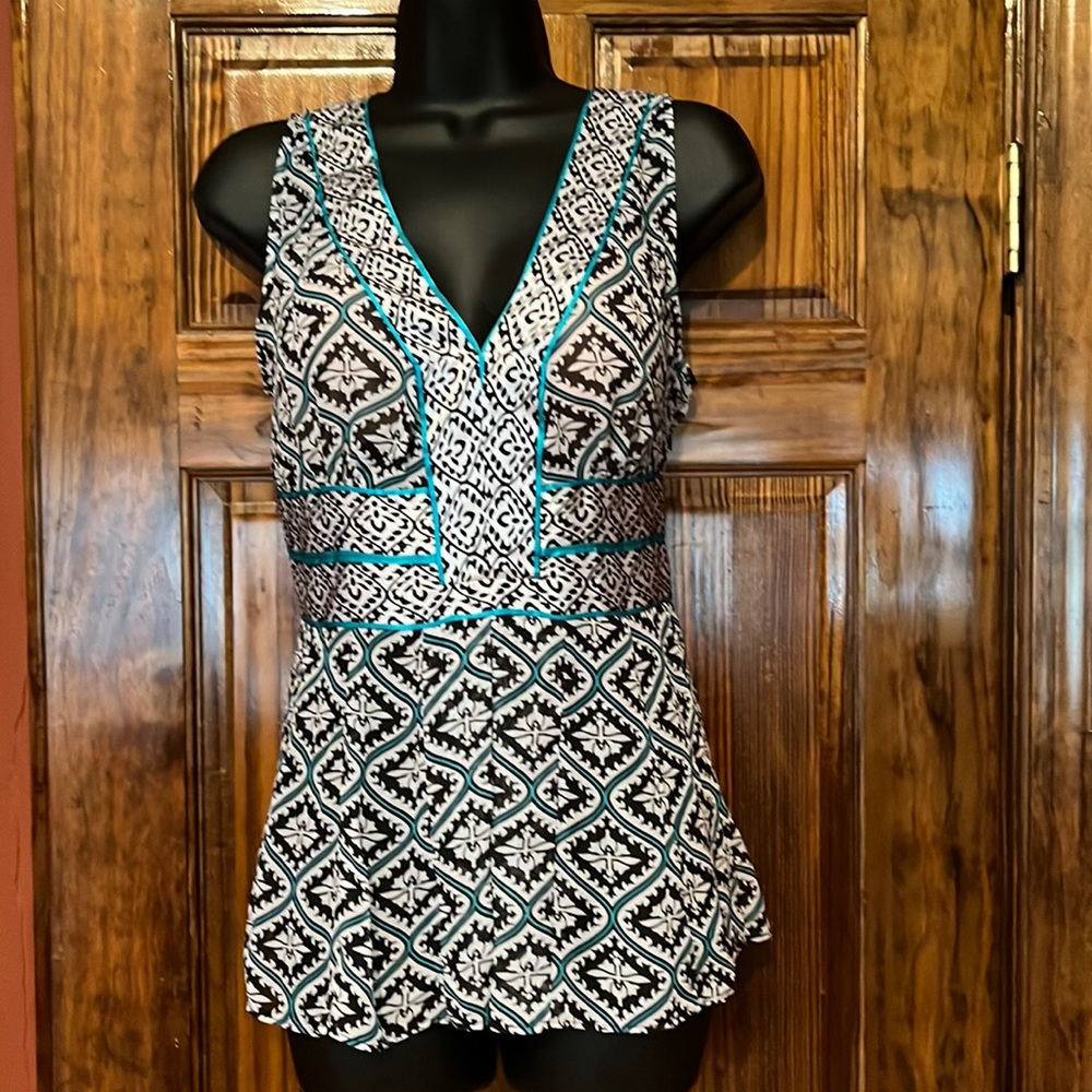 Nicole Silky Sleeveless Baby Doll Top